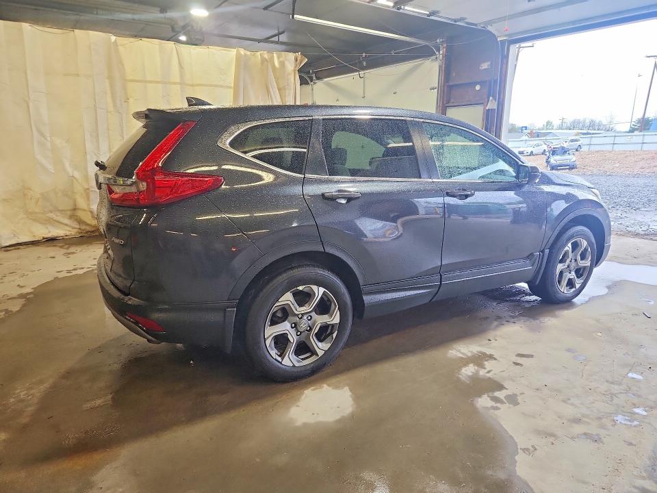 Photo 3 from auction – 2018 HONDA CR-V with VIN 2HKRW2H59JH623008