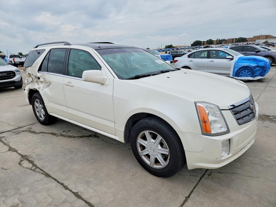Фото 4 с аукциона – 2004 CADILLAC SRX с VIN 1GYEE637140147009
