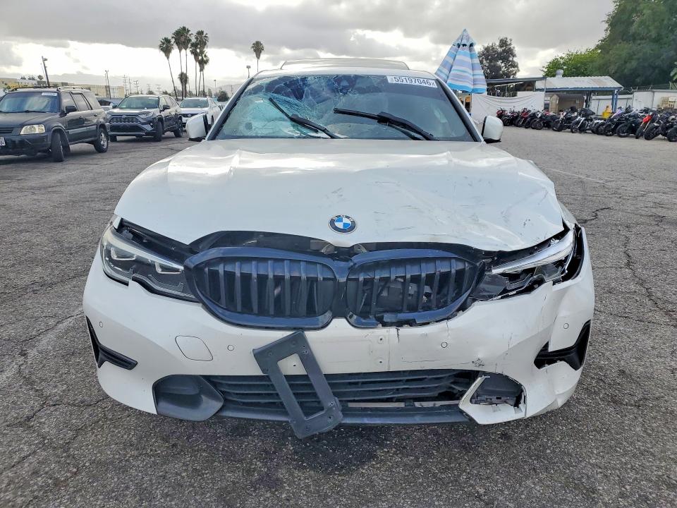 Photo 5 from auction – 2021 BMW 330I with VIN 3MW5R1J07M8B49904