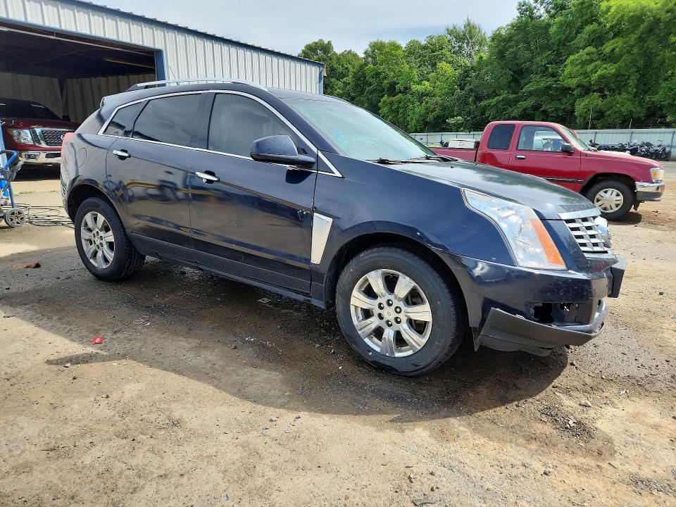 Photo 4 from auction – 2014 CADILLAC SRX with VIN 3GYFNBE32ES628842