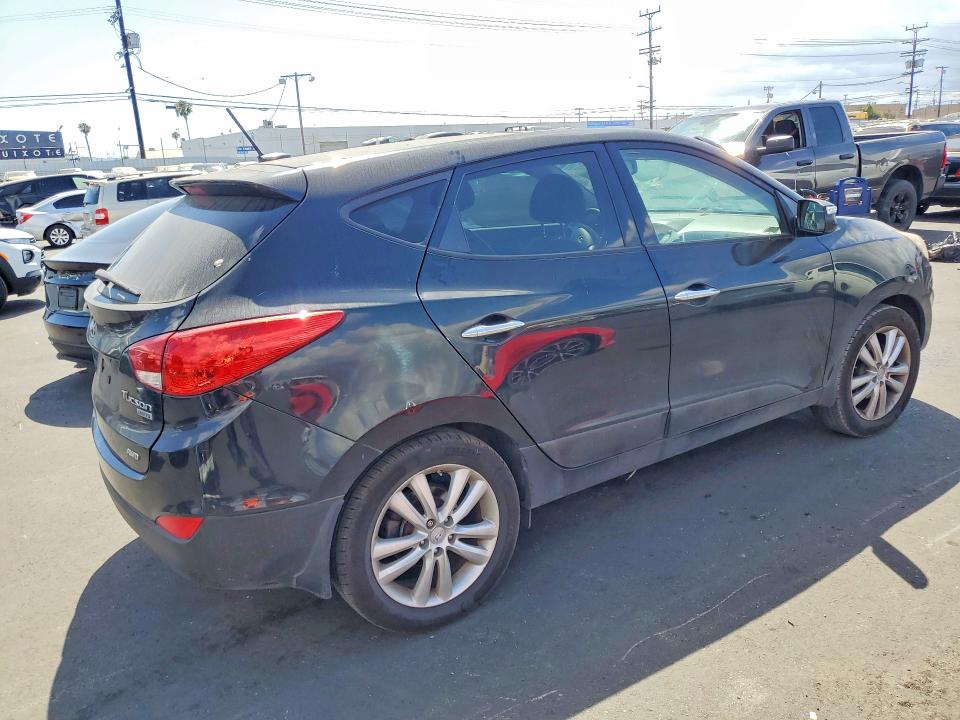 Photo 3 from auction – 2012 HYUNDAI TUCSON with VIN KM8JUCAC3CU510239