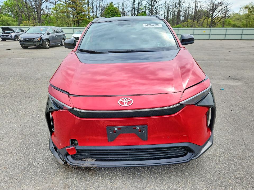 Photo 5 from auction – 2023 TOYOTA BZ4X with VIN JTMABACA9PA042177