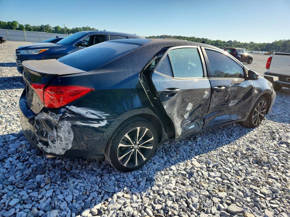 Photo 3 from auction – 2018 TOYOTA COROLLA with VIN 5YFBURHE3JP799099