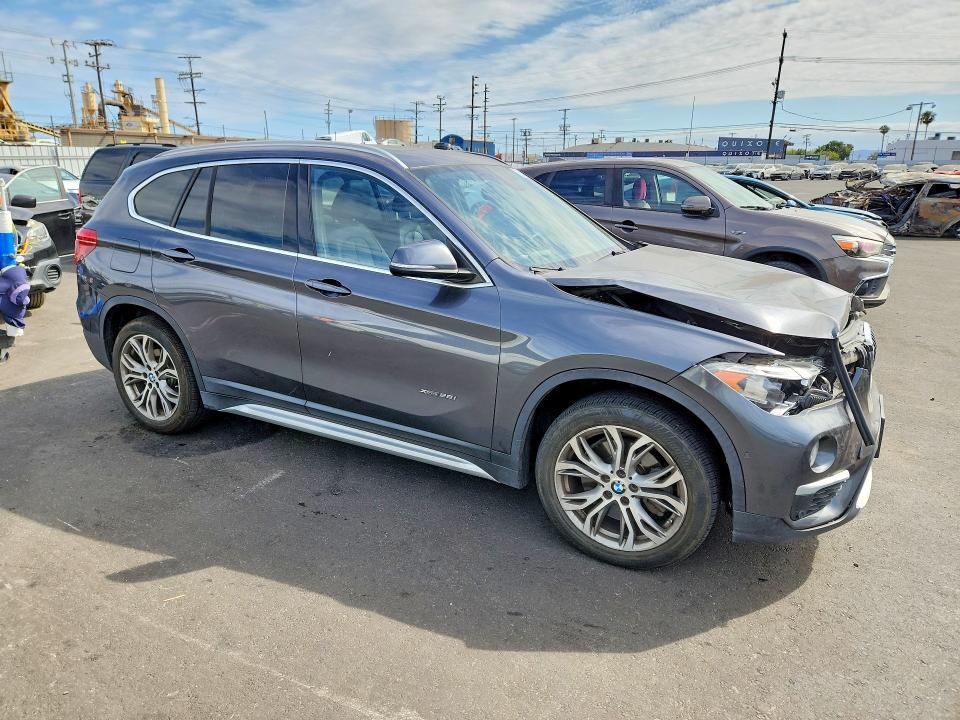 Photo 4 from auction – 2016 BMW X1 with VIN WBXHT3Z32G4A47743