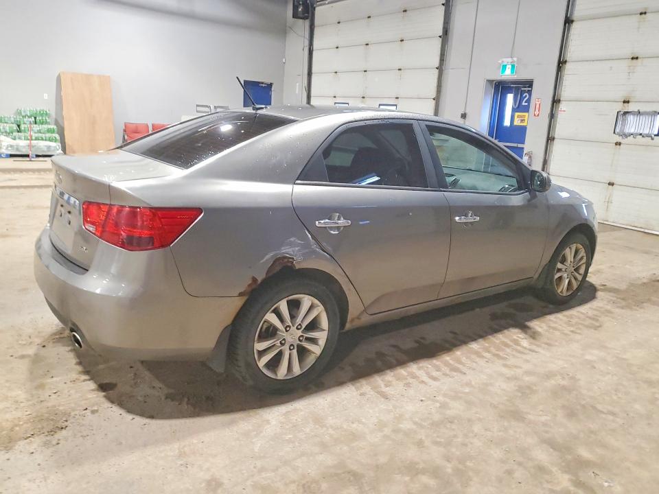 Photo 3 from auction – 2011 KIA FORTE with VIN KNAFW4A36B5384524