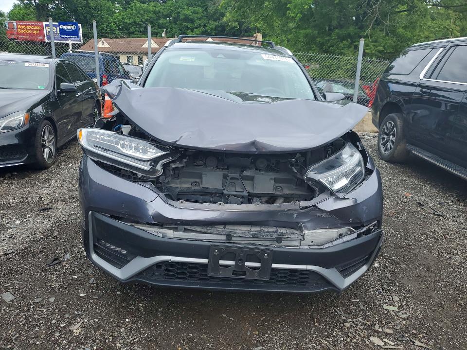 Photo 5 from auction – 2022 HONDA CR-V with VIN 5J6RT6H86NL036660