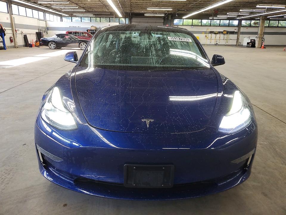 Photo 5 from auction – 2022 TESLA MODEL 3 with VIN 5YJ3E1EA7NF371025