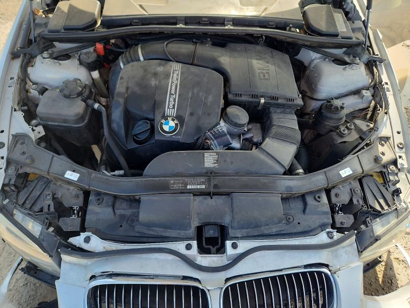 Photo 11 from auction – 2011 BMW 335 with VIN WBADX7C55BE743740