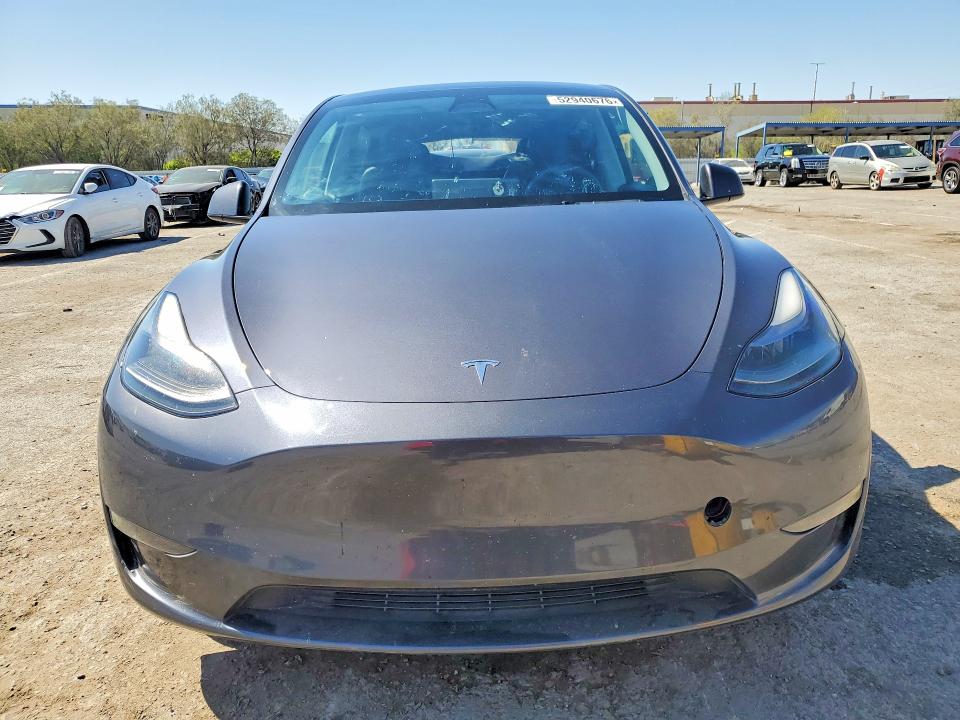 Photo 5 from auction – 2023 TESLA MODEL Y with VIN 7SAYGAEE6PF700385
