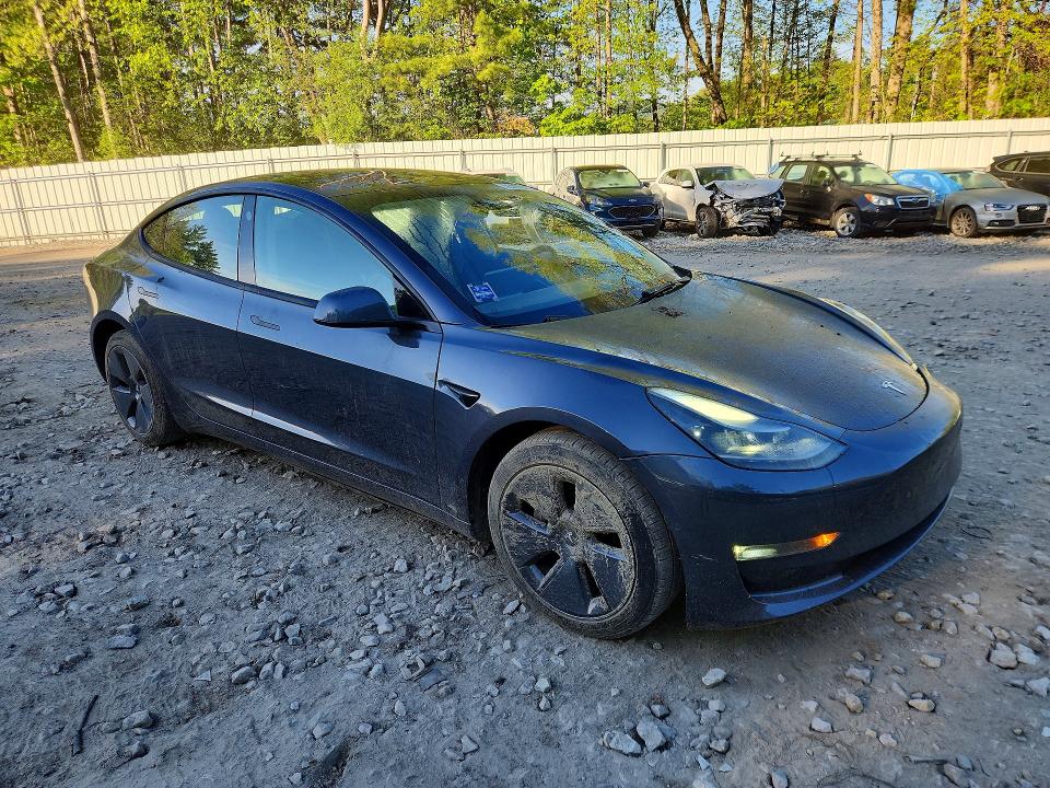 Photo 4 from auction – 2022 TESLA MODEL 3 with VIN 5YJ3E1EB5NF235338