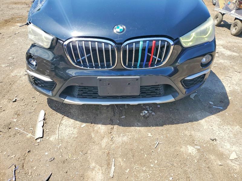 Photo 12 from auction – 2017 BMW X1 with VIN WBXHT3C32H5F72788