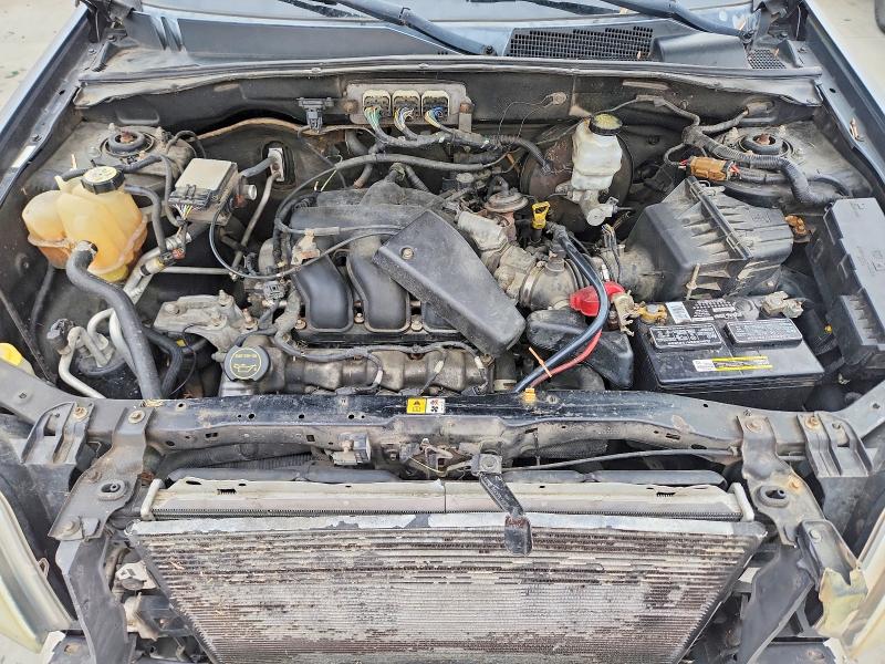 Photo 12 from auction – 2008 MERCURY MARINER with VIN 4M2CU91138KJ08698