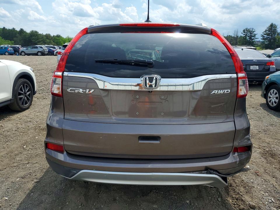 Photo 6 from auction – 2016 HONDA CR-V with VIN 2HKRM4H75GH722551