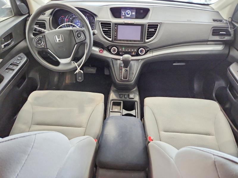 Photo 8 from auction – 2016 HONDA CR-V with VIN 2HKRM4H50GH675220
