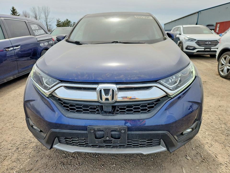 Photo 5 from auction – 2018 HONDA CR-V with VIN 2HKRW2H56JH122402