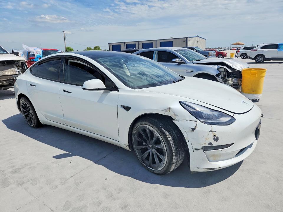Photo 4 from auction – 2022 TESLA MODEL 3 with VIN 5YJ3E1EB8NF205654