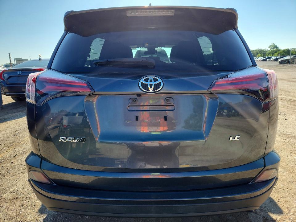 Photo 6 from auction – 2018 TOYOTA RAV4 with VIN JTMZFREV5JD109675