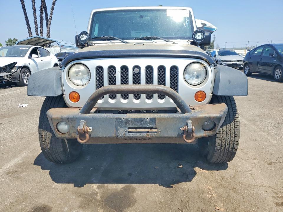 Photo 5 from auction – 2007 JEEP WRANGLER with VIN 1J8GA69137L191022