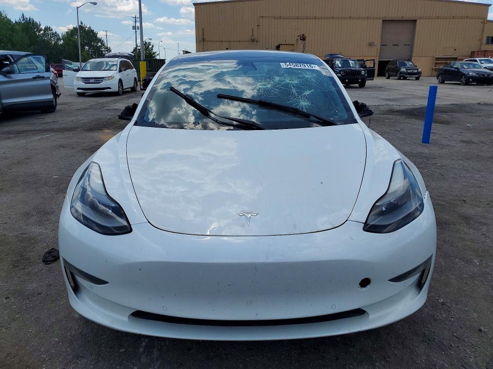 Photo 5 from auction – 2022 TESLA MODEL 3 with VIN 5YJ3E1EB6NF103222