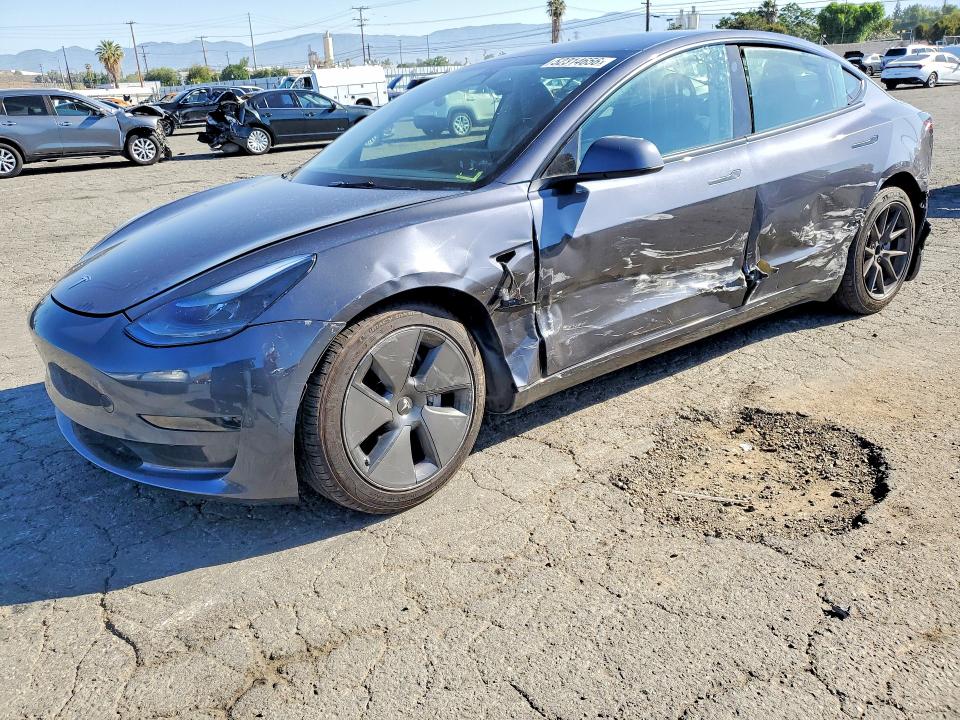 TESLA MODEL 3 2023 with VIN 5YJ3E1EA5PF692323 - Photo from auction
