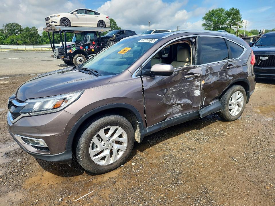 Photo 1 from auction – 2015 HONDA CR-V with VIN 2HKRM3H76FH539197