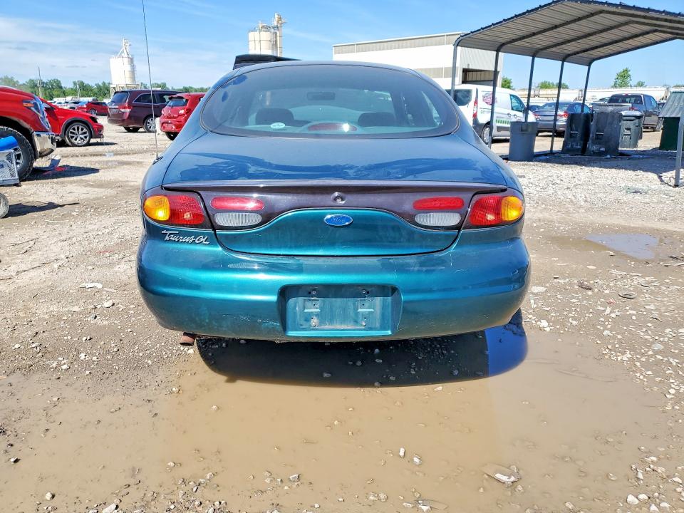 Zdjęcie 6 z aukcji – 1997 FORD TAURUS z VIN 1FALP5224VG221111