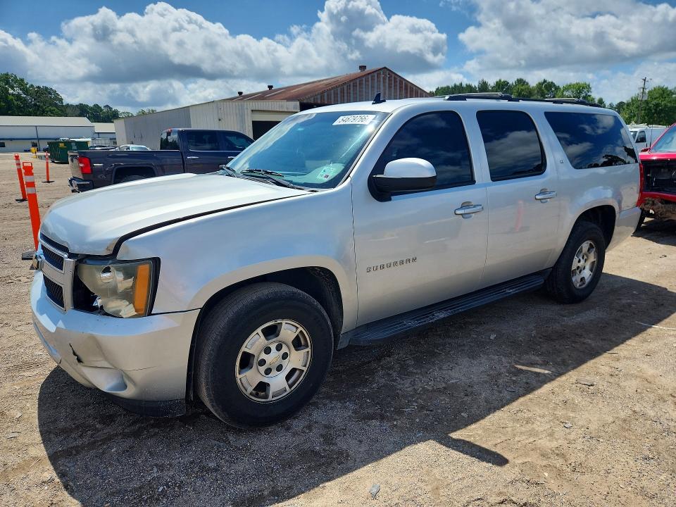 CHEVROLET SUBURBAN 2011 with VIN 1GNSCJE04BR286388 - Photo from auction