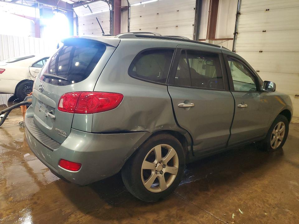 Photo 3 from auction – 2009 HYUNDAI SANTA FE with VIN 5NMSH73EX9H332414