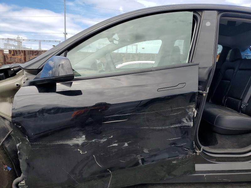 Photo 7 from auction – 2024 TESLA MODEL Y with VIN 7SAYGDEE4RA235686