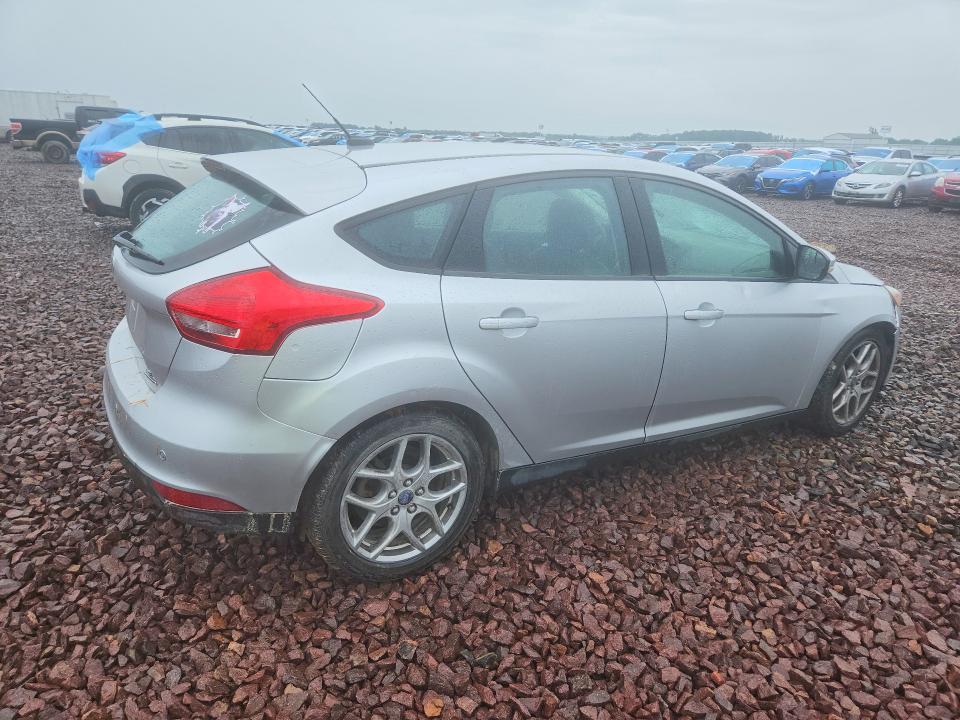 Photo 3 from auction – 2015 FORD FOCUS with VIN 1FADP3K20FL255502