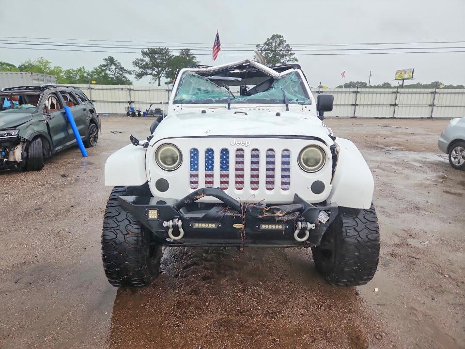Photo 5 from auction – 2014 JEEP WRANGLER with VIN 1C4AJWBG2EL194468