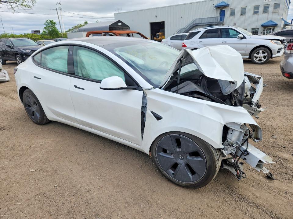 Photo 4 from auction – 2022 TESLA MODEL 3 with VIN 5YJ3E1EA3NF249164
