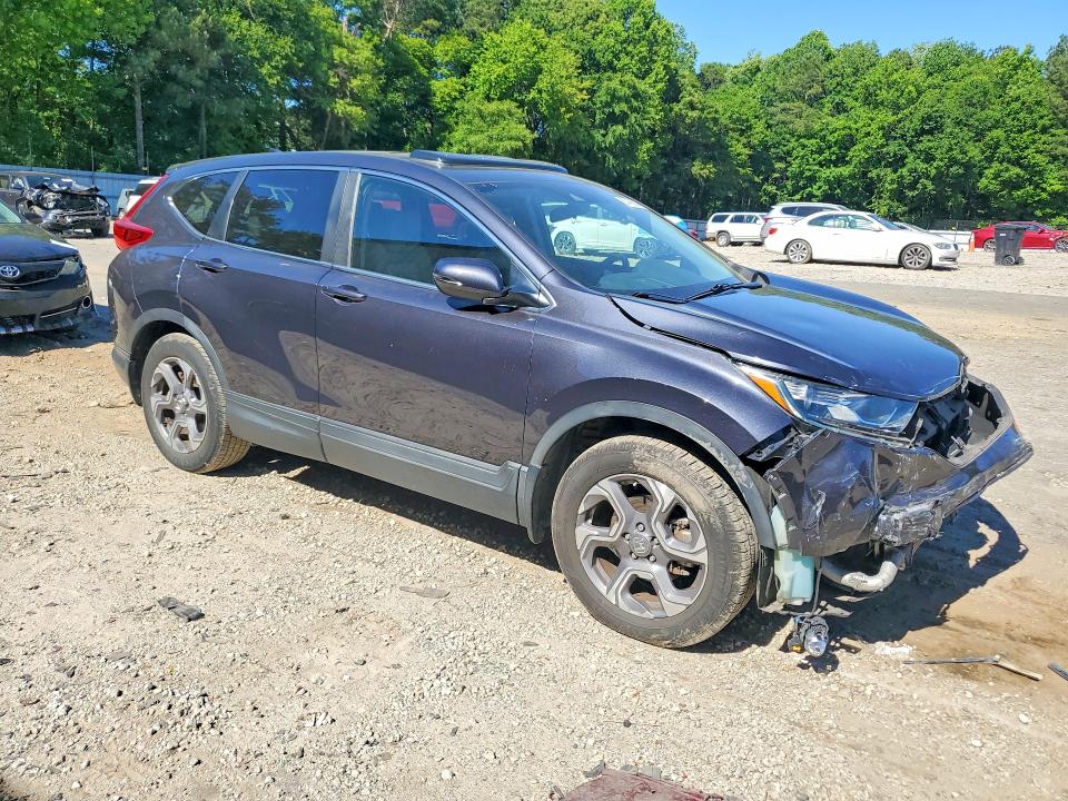 Photo 4 from auction – 2017 HONDA CR-V with VIN 7FARW1H51HE031304