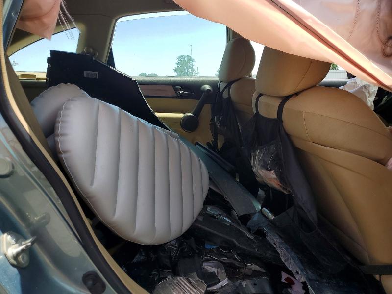 Photo 11 from auction – 2011 HONDA CR -V with VIN 5J6RE4H3XBL028138