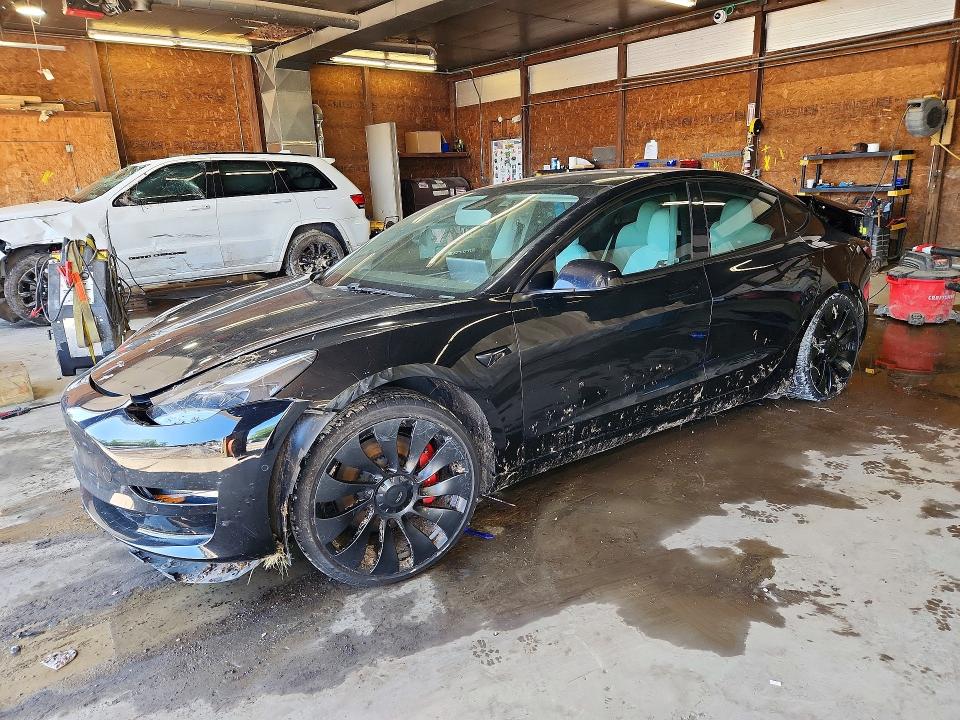 TESLA MODEL 3 2021 with VIN 5YJ3E1EC5MF988469 - Photo from auction