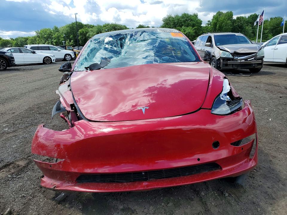 Photo 5 from auction – 2022 TESLA MODEL 3 with VIN 5YJ3E1EA2NF187773