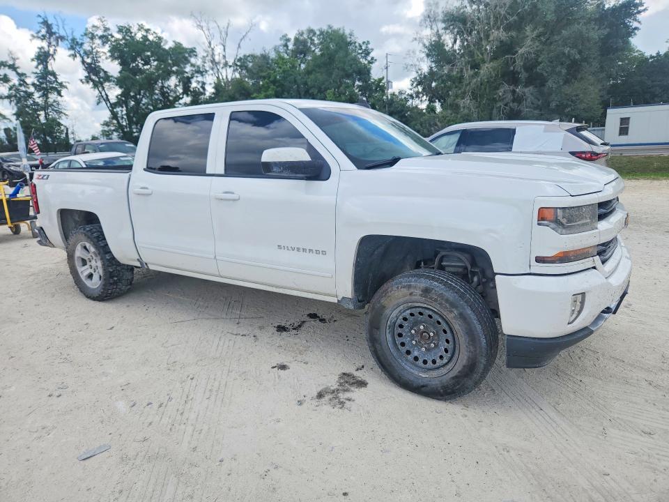 Photo 4 from auction – 2018 CHEVROLET SILVERADO with VIN 3GCUKREC4JG515731