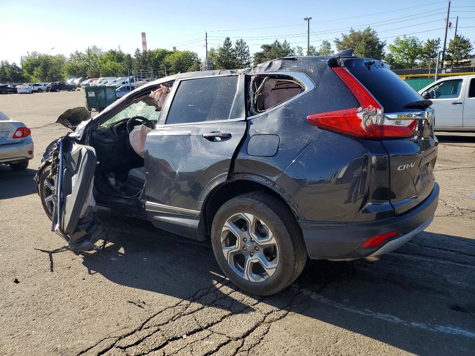 Photo 2 from auction – 2017 HONDA CR-V with VIN 2HKRW2H83HH668790
