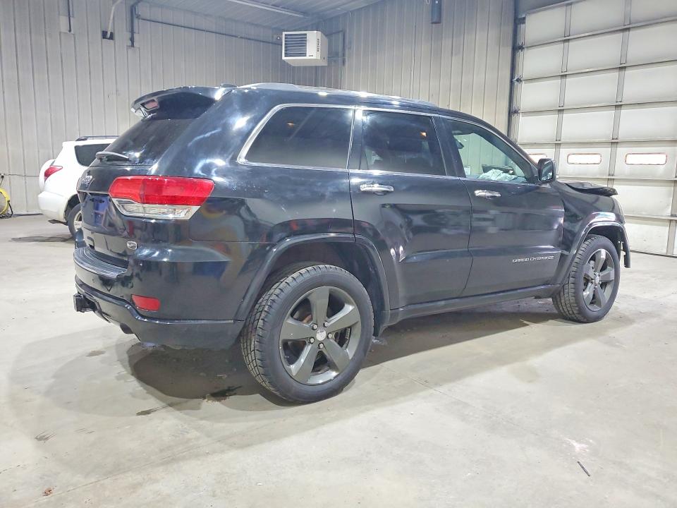 Photo 3 from auction – 2014 JEEP GRAND CHEROKEE with VIN 1C4RJFCG9EC129229