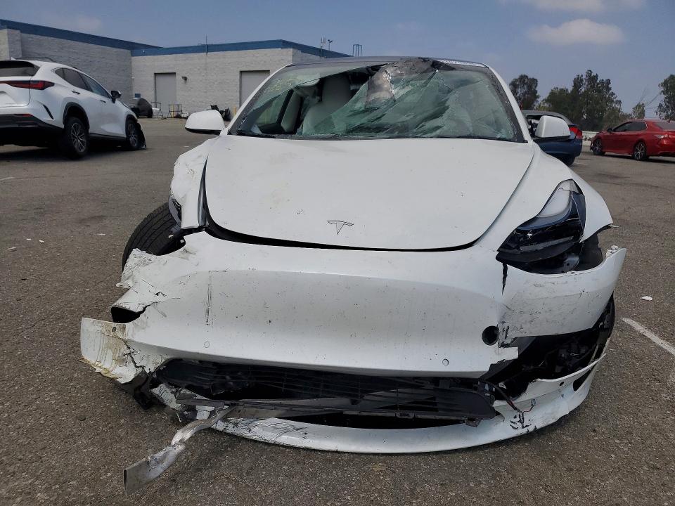 Photo 5 from auction – 2022 TESLA MODEL 3 with VIN 5YJ3E1EB3NF131768