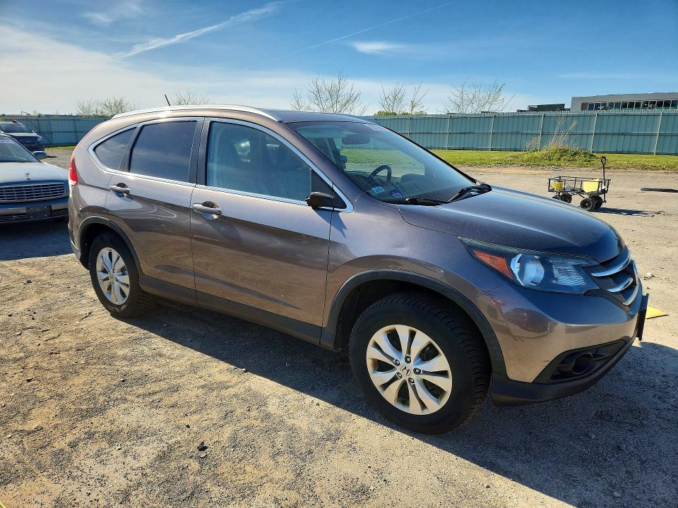 Photo 4 from auction – 2014 HONDA CR-V with VIN 5J6RM4H72EL017631