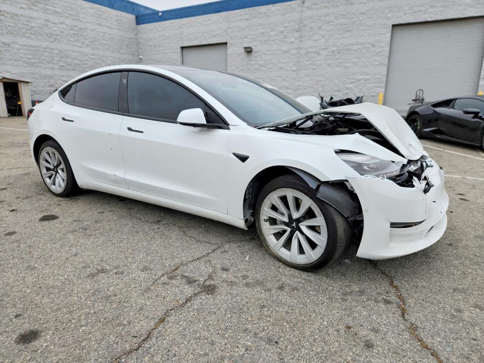 Photo 4 from auction – 2021 TESLA MODEL 3 with VIN 5YJ3E1EA0MF070675