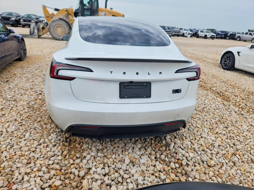 Photo 6 from auction – 2025 TESLA MODEL 3 with VIN 5YJ3E1ET9SF077851