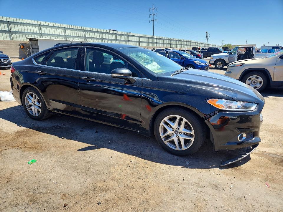 Photo 4 from auction – 2016 FORD FUSION with VIN 3FA6P0H73GR380989