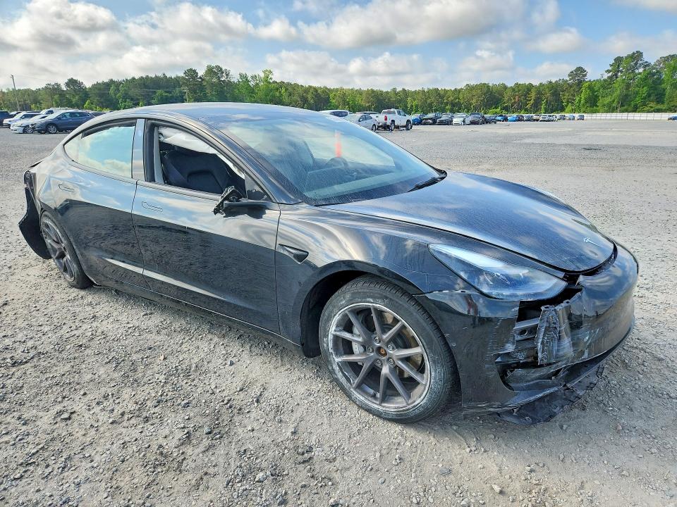 Photo 4 from auction – 2022 TESLA MODEL 3 with VIN 5YJ3E1EB9NF202472