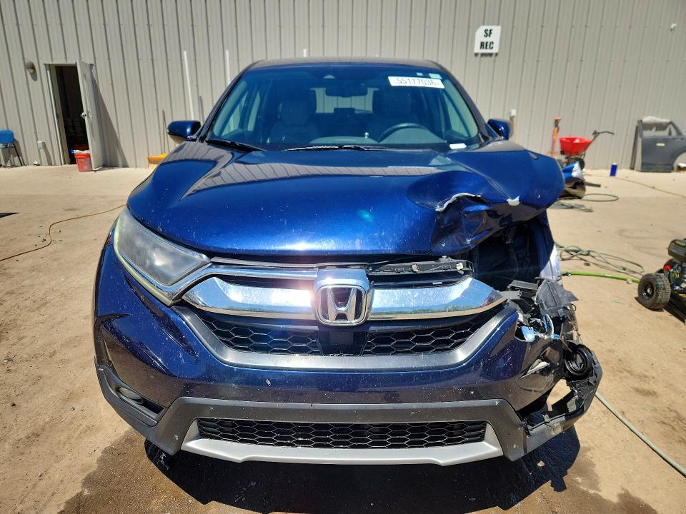 Photo 5 from auction – 2018 HONDA CR-V with VIN 7FARW2H83JE053004