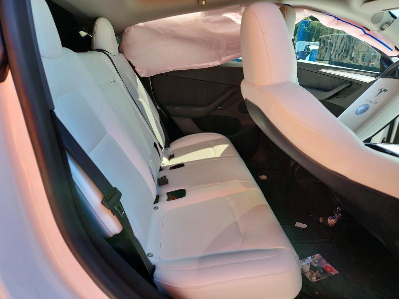 Photo 11 from auction – 2023 TESLA MODEL Y with VIN 7SAYGDEE2PF703107