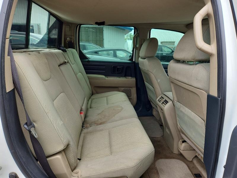 Photo 11 from auction – 2009 HONDA RIDGELINE with VIN 5FPYK16219B102621