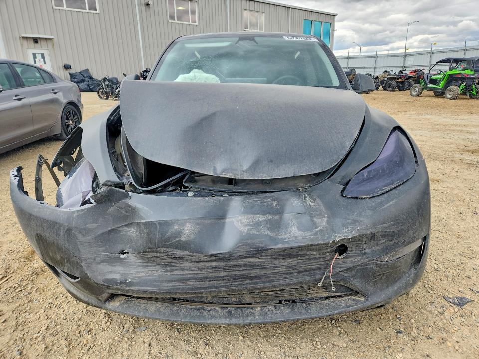 Photo 5 from auction – 2023 TESLA MODEL Y with VIN LRWYGDFD3PC057864