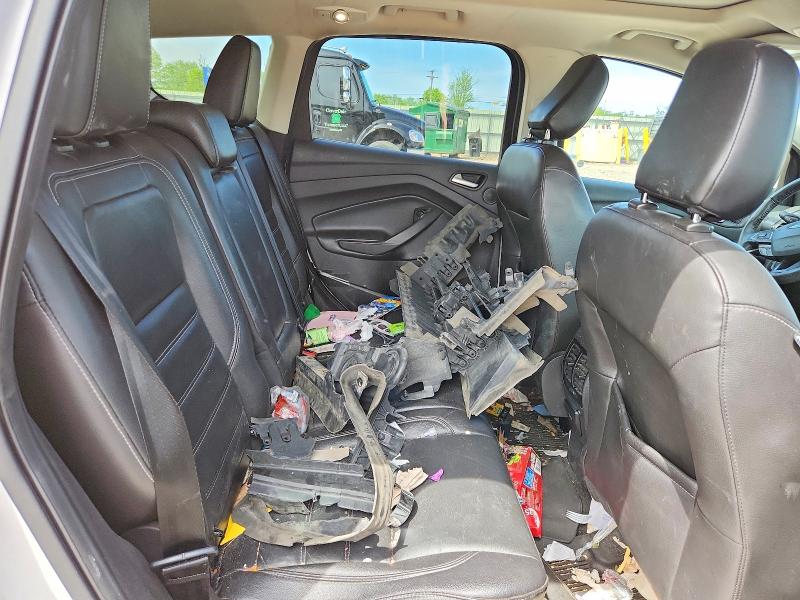 Photo 11 from auction – 2018 FORD ESCAPE with VIN 1FMCU9J95JUA15036